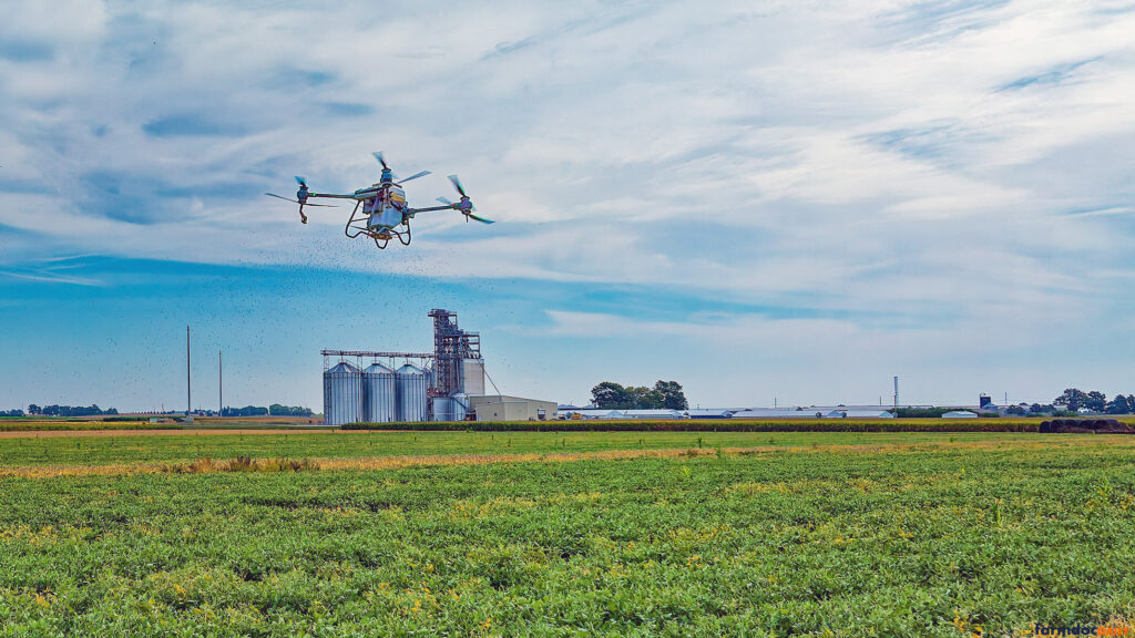 Researchers utilize drone technology to aerially interseed cover crops into standing soybeans at the Farm of the Future. The site hosts the University of Illinois' Illinois Farming and Regenerative Management (I-FARM) study, which evaluates sustainable agricultural practices. (Photo: Jim Baltz)